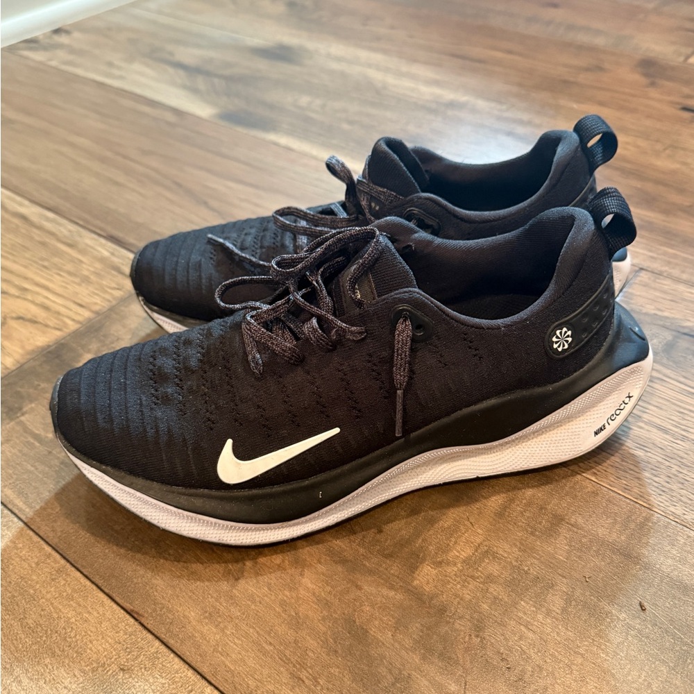 Nike Men's Black and White Athletic Shoes, gently used.